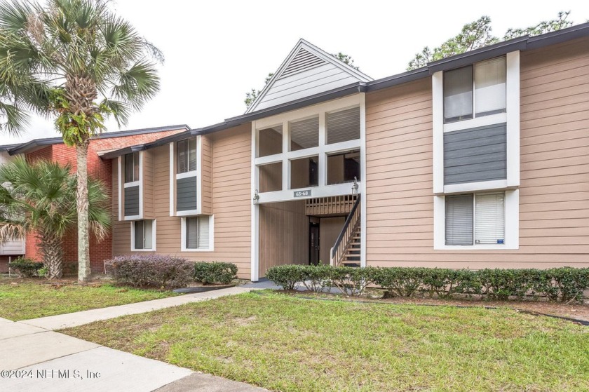 Discover the charm of this 2 bedroom, 1 bathroom condo situated - Beach Condo for sale in Jacksonville, Florida on Beachhouse.com