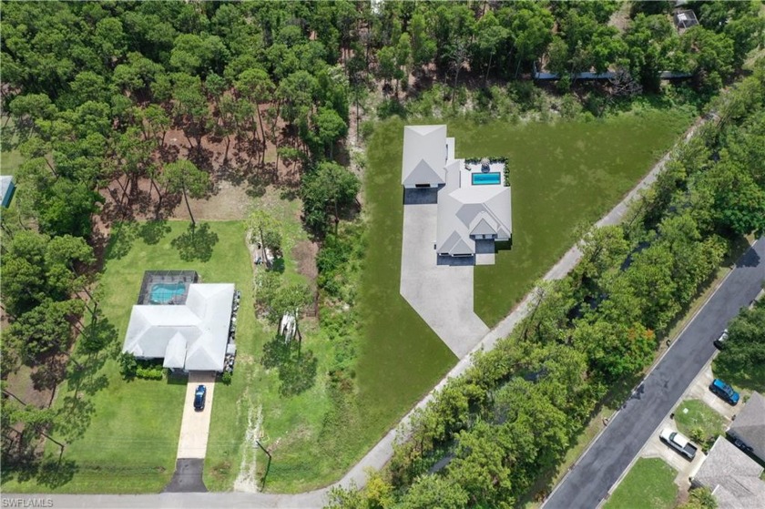 This exceptional 2.18 corner lot offers a rare opportunity to - Beach Acreage for sale in Bonita Springs, Florida on Beachhouse.com