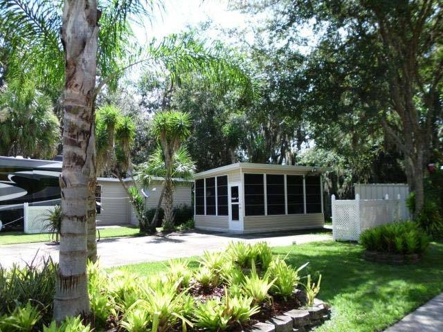 Come home to a shady, quiet 40'X80' RV lot that backs up to - Beach Home for sale in Titusville, Florida on Beachhouse.com