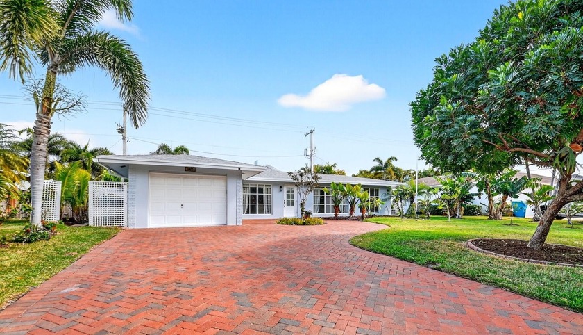 Discover this beautifully updated 3-bedroom, 2-bath pool home in - Beach Home for sale in Boynton Beach, Florida on Beachhouse.com