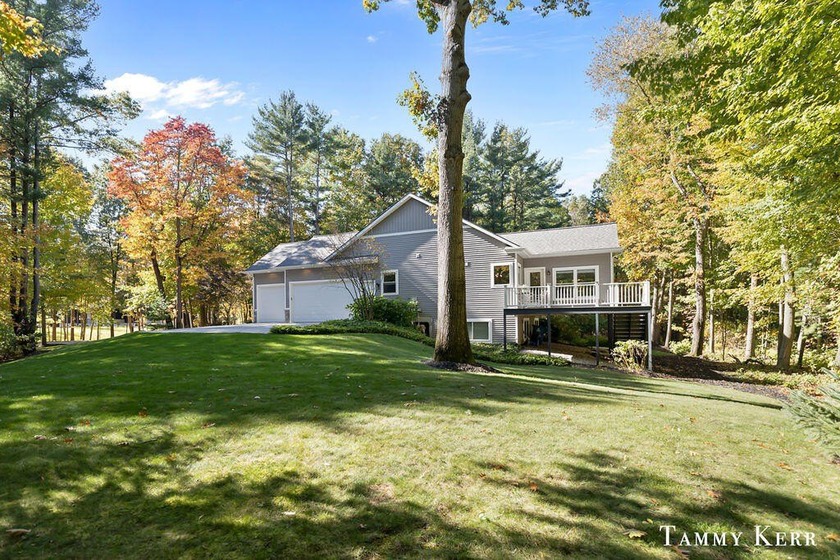 Beautifully maintained ranch home offering 3 bedrooms and 2.5 - Beach Home for sale in Saugatuck, Michigan on Beachhouse.com