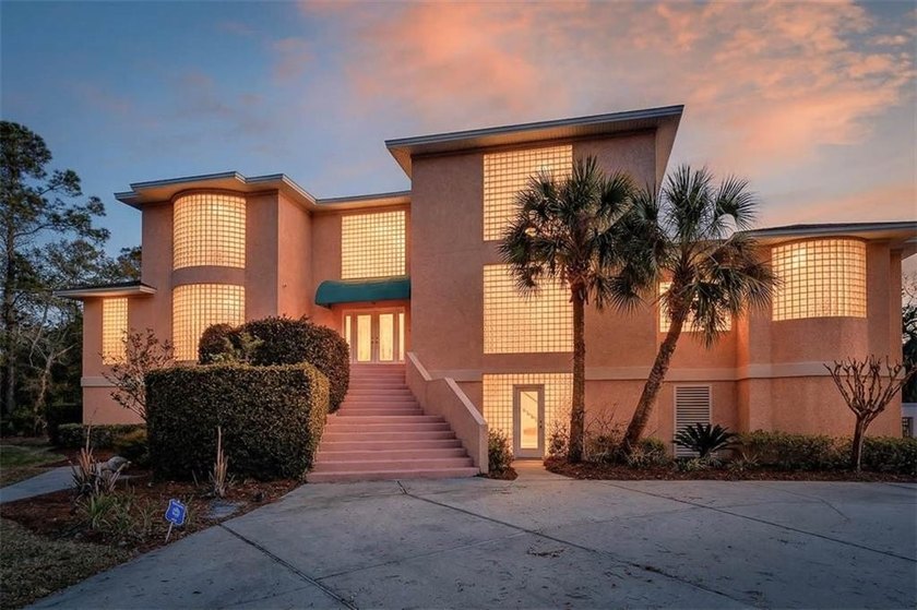 Set on a rare and breathtaking 2.61-acre deep water lot, this - Beach Home for sale in Brunswick, Georgia on Beachhouse.com