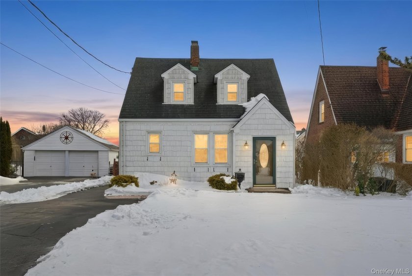 Set along a quiet canal just moments from the open bay, this two - Beach Home for sale in Amityville, New York on Beachhouse.com