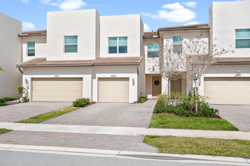 Nestled within the exclusive Andalucia community, this exquisite - Beach Townhome/Townhouse for sale in Lake Worth, Florida on Beachhouse.com