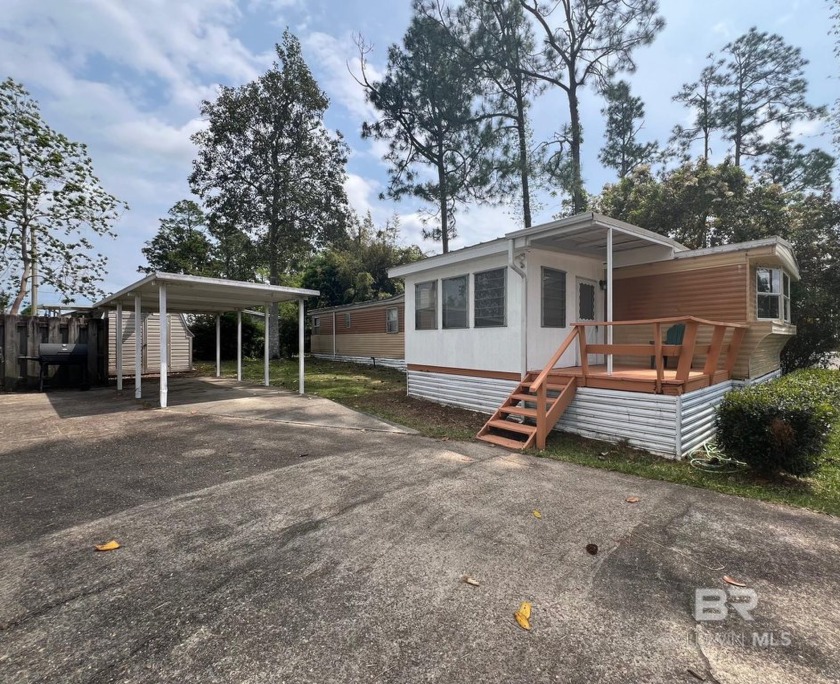 Welcome to this charming Coastal retreat a 2-bedroom, 1-bathroom - Beach Home for sale in Lillian, Alabama on Beachhouse.com