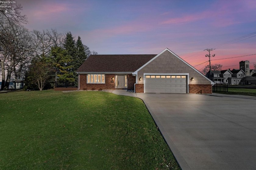 Discover elevated lakeside living at 502 Stone St in the heart - Beach Home for sale in Marblehead, Ohio on Beachhouse.com