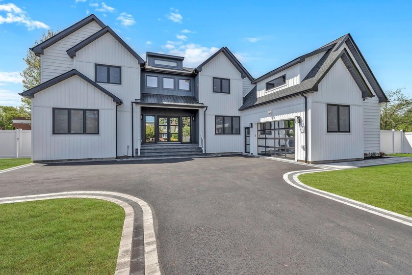 Welcome to this luxurious and captivating modern farmhouse brand - Beach Home for sale in West Islip, New York on Beachhouse.com