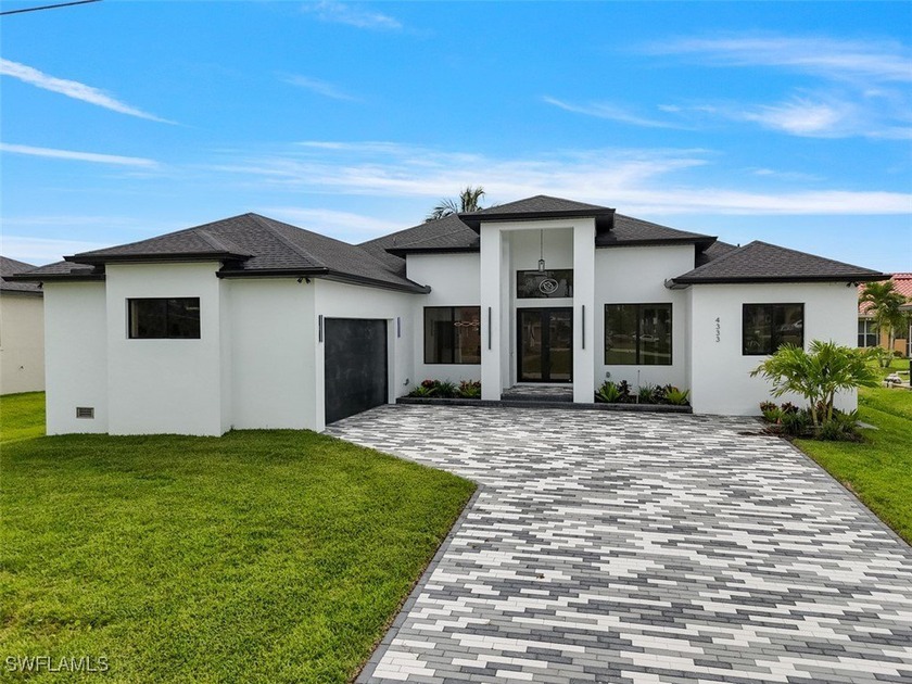 Step into this BEAUTIFUL NEW Construction home. It's the perfect - Beach Home for sale in Cape Coral, Florida on Beachhouse.com