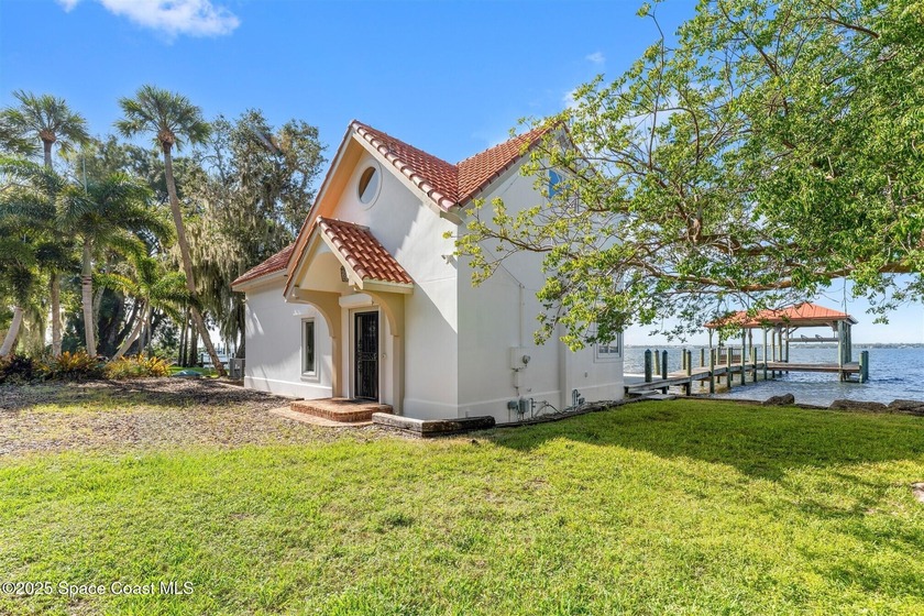 This beautiful waterfront home on South Tropical Trail combines - Beach Home for sale in Merritt Island, Florida on Beachhouse.com