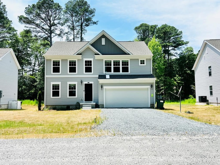 Welcome to your dream home in the desirable Captains Cove - Beach Home for sale in Greenbackville, Virginia on Beachhouse.com