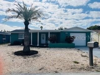 This Spacious 3 Bedroom 2 Bath open floor plan with newer - Beach Home for sale in Holiday, Florida on Beachhouse.com