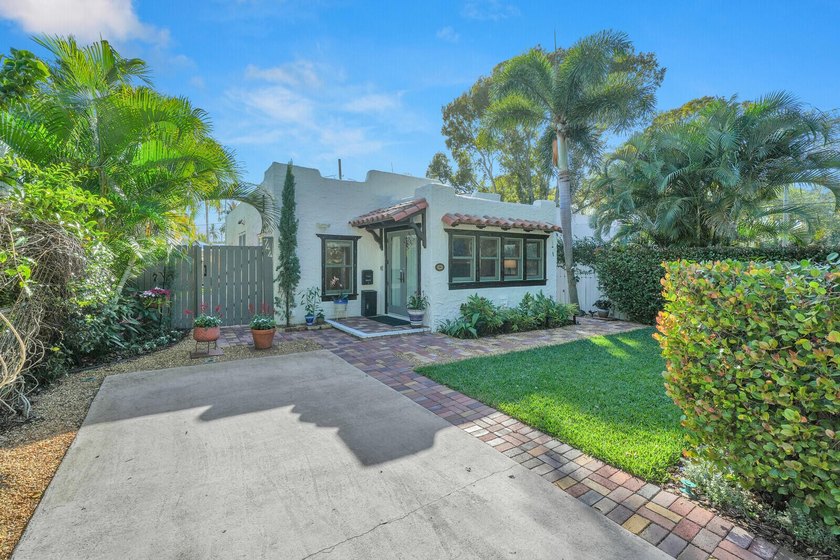 Step into Casa las Flores, an exquisite 1925 sanctuary that - Beach Home for sale in West Palm Beach, Florida on Beachhouse.com