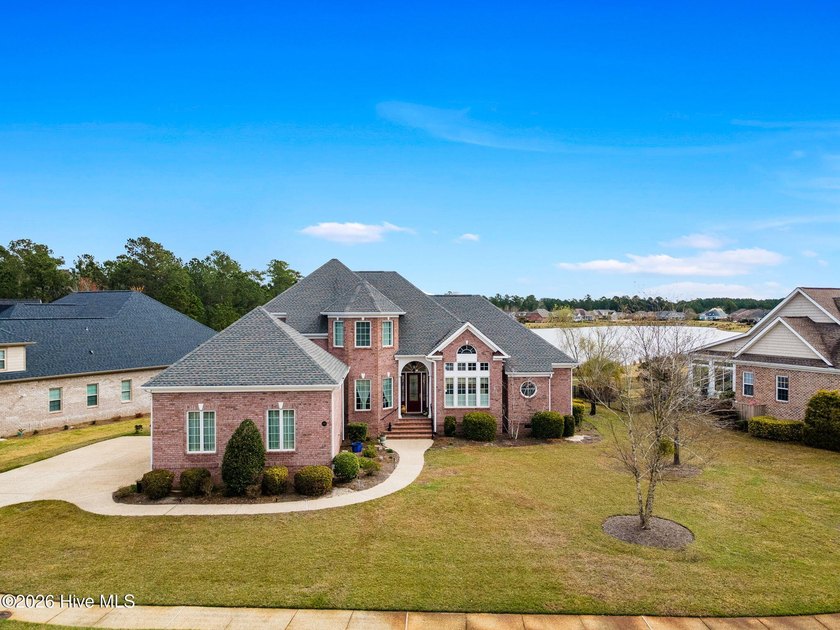 Welcome to this stunning all-brick home in the highly - Beach Home for sale in Leland, North Carolina on Beachhouse.com