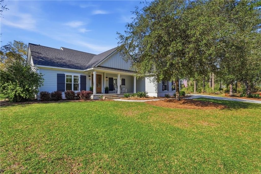 Welcome to 1205 Mulligan Dr. NE. in the gated Cooper's Point - Beach Home for sale in Townsend, Georgia on Beachhouse.com