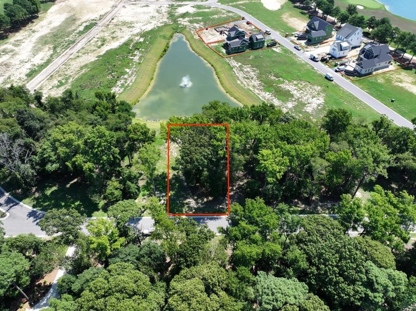 This Wonderful wooded homesite backs up to a pond, and with its - Beach Lot for sale in Cape Charles, Virginia on Beachhouse.com