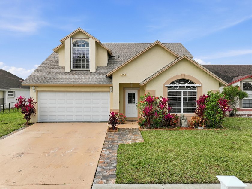 Beautifully updated throughout and move in ready! Open & - Beach Home for sale in West Palm Beach, Florida on Beachhouse.com