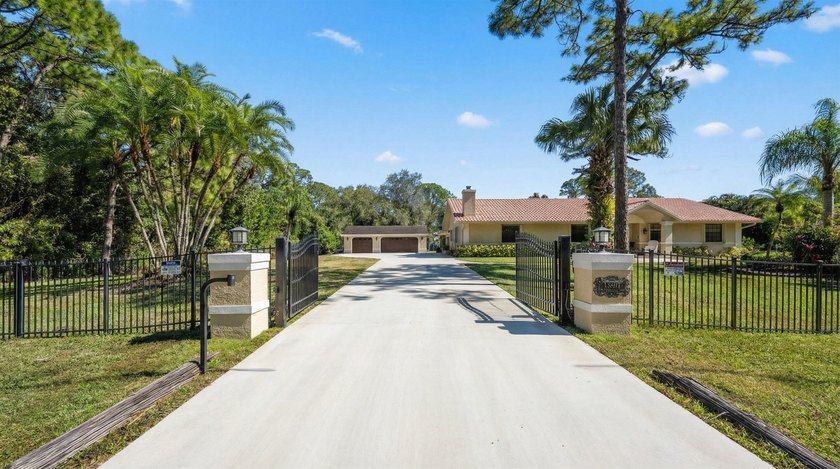 Live the lifestyle you've been dreaming of in this impressive - Beach Home for sale in Palm Beach Gardens, Florida on Beachhouse.com