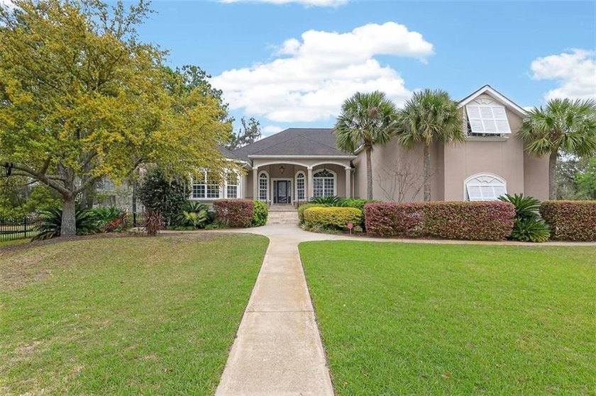 Step into luxury in the highly sought-after Oak Forest - Beach Home for sale in Saint Simons, Georgia on Beachhouse.com