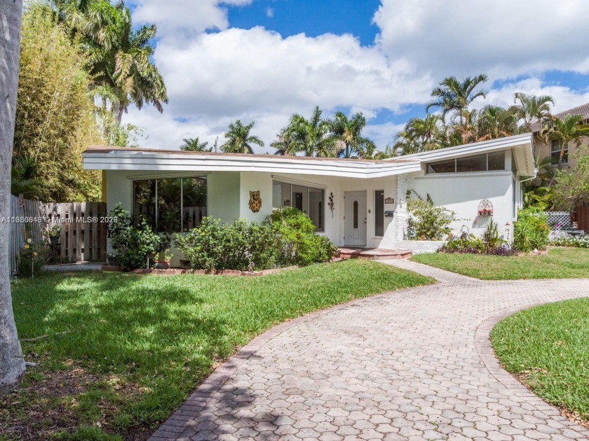 A MAGNIFICENT MID CENTURY MODERN WITH AN AMAZING MULTI-LEVEL - Beach Home for sale in Hollywood, Florida on Beachhouse.com