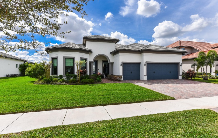 This exquisite residence showcases numerous upgrades such as a - Beach Home for sale in Lake Worth, Florida on Beachhouse.com