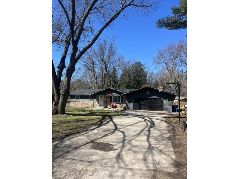 Rare opportunity to own a move-in-ready home in Juniper Hills - Beach Home for sale in Ludington, Michigan on Beachhouse.com