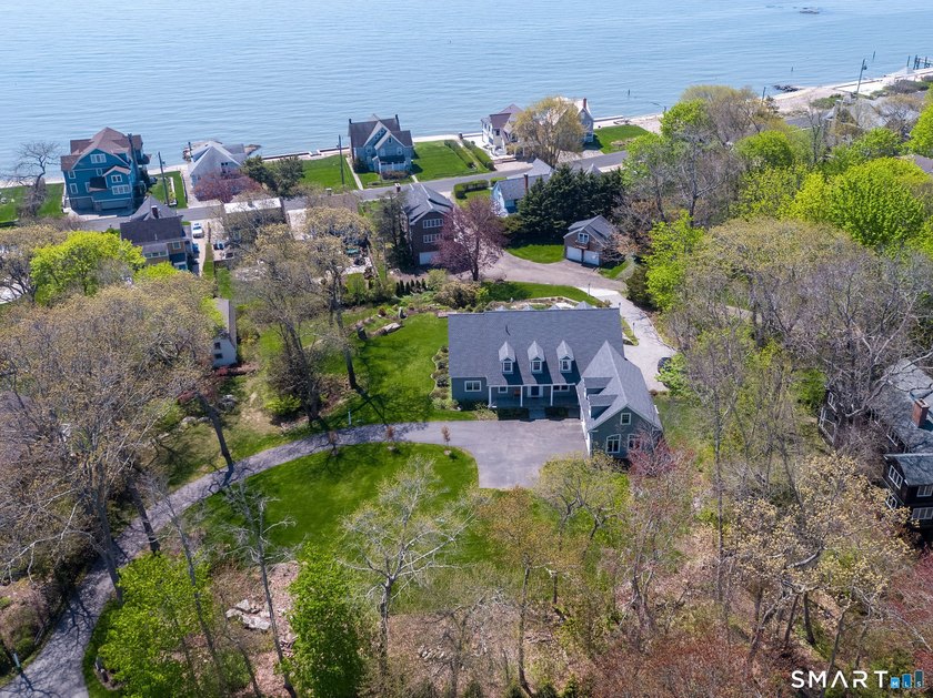 Set back from Middle Beach Rd and sited 25' above sea level (so - Beach Home for sale in Madison, Connecticut on Beachhouse.com