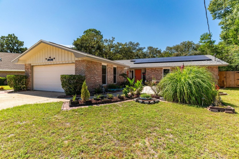 This charming, one-owner home is ready for you! The thoughtfully - Beach Home for sale in Fort Walton Beach, Florida on Beachhouse.com