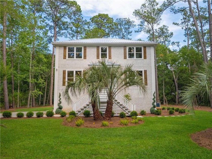 Where coastal tradition meets contemporary luxury. Discover a - Beach Home for sale in Saint Simons, Georgia on Beachhouse.com