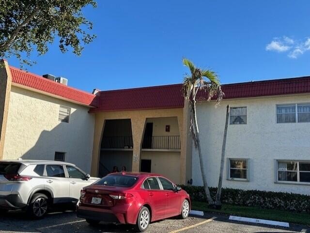 Resort-Style Living with Lake Views!  Welcome to this bright and - Beach Condo for sale in West Palm Beach, Florida on Beachhouse.com