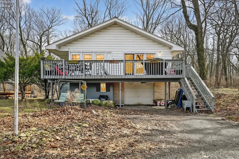 Enjoy lakeview island living in this inviting 4-bedroom, 2 full - Beach Home for sale in Put-In-Bay, Ohio on Beachhouse.com