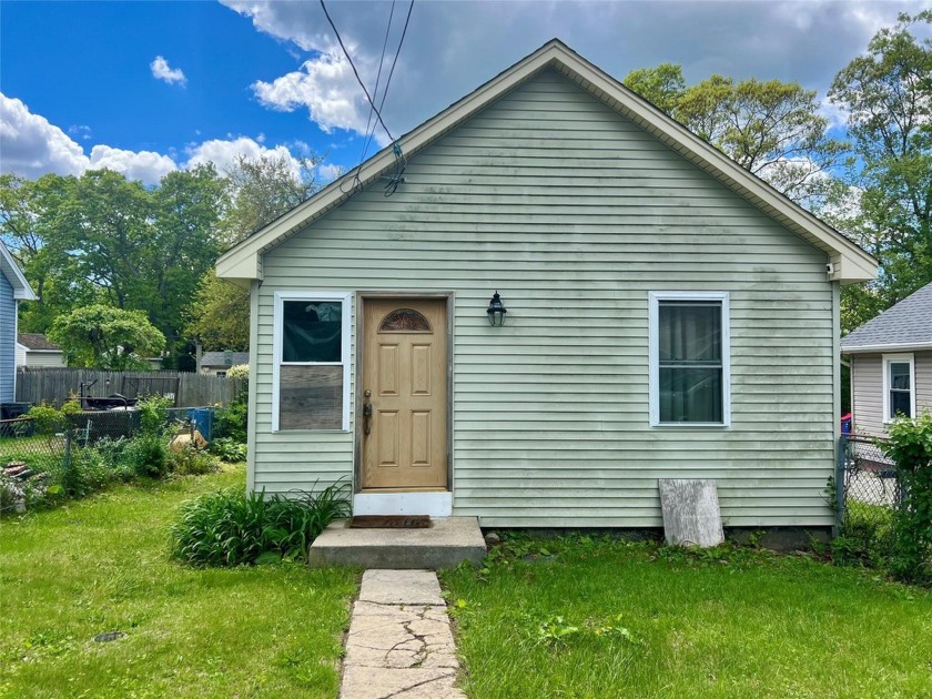 This 704 sq. ft. North Shore gem offers endless potential for - Beach Home for sale in Rocky Point, New York on Beachhouse.com