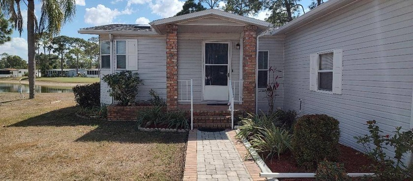WELCOME TO YOUR NEW HOME IN PINE LAKES! THIS FABULOUS HOME IS - Beach Home for sale in North Fort Myers, Florida on Beachhouse.com