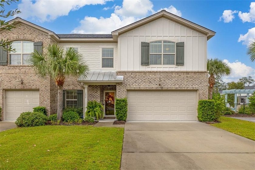 Don't miss this rare end-unit home with a 2-car garage and - Beach Townhome/Townhouse for sale in Saint Simons, Georgia on Beachhouse.com