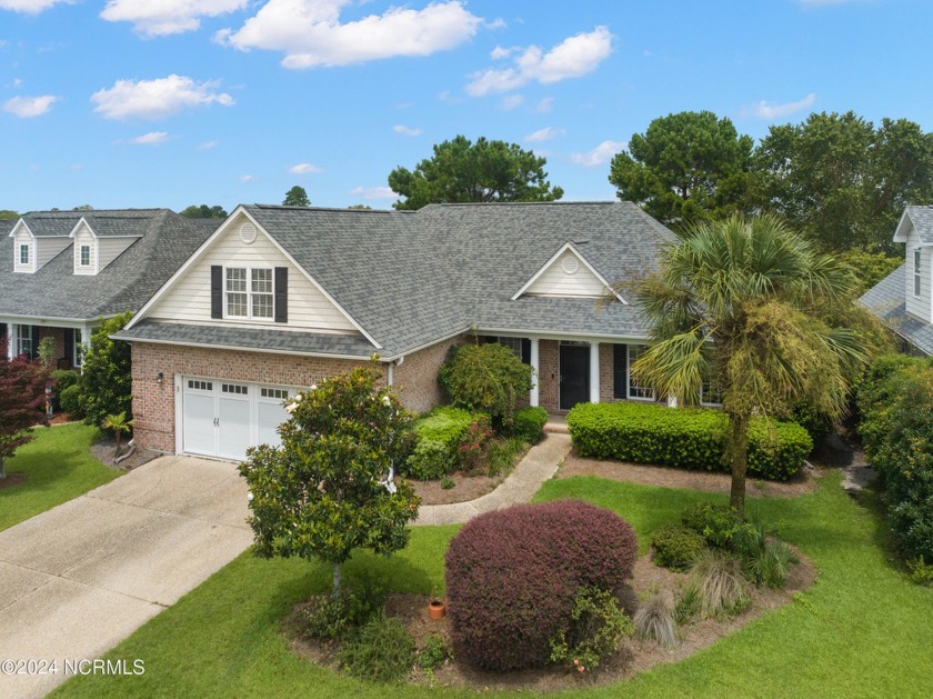 Nestled on a tranquil cul-de-sac, this stunning home offers - Beach Home for sale in Leland, North Carolina on Beachhouse.com