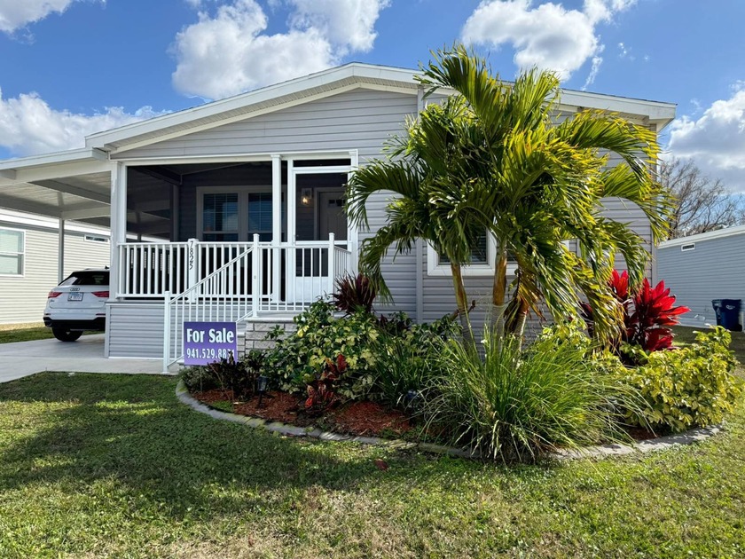 This beautifully designed 1,664 sq. ft. home features vaulted - Beach Home for sale in Ellenton, Florida on Beachhouse.com