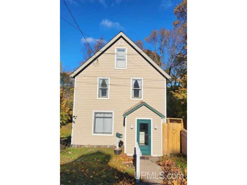 Look no further than this charming home. Situated amongst mature - Beach Home for sale in Houghton, Michigan on Beachhouse.com