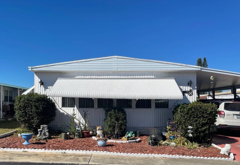 Step into this spacious and inviting 2-bedroom, 2-bath home - Beach Home for sale in Port Richey, Florida on Beachhouse.com