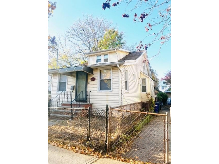 Legal two-family residence featuring a spacious upper-and-lower - Beach Home for sale in Jamaica, New York on Beachhouse.com