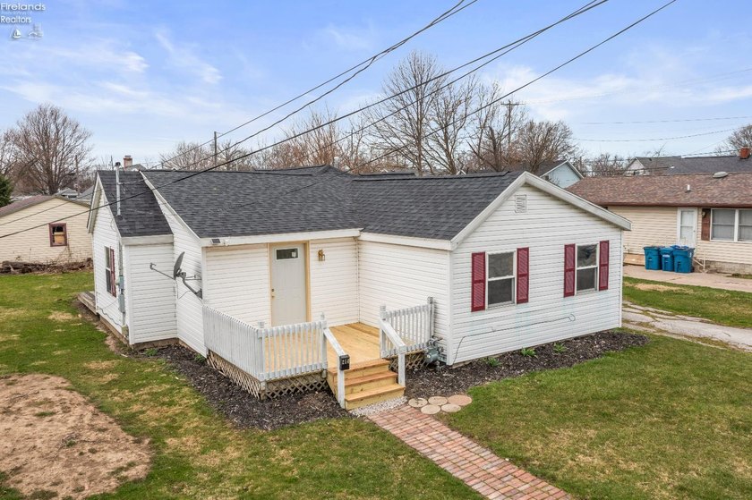 Just two blocks from the shores of Lake Erie, this updated - Beach Home for sale in Port Clinton, Ohio on Beachhouse.com