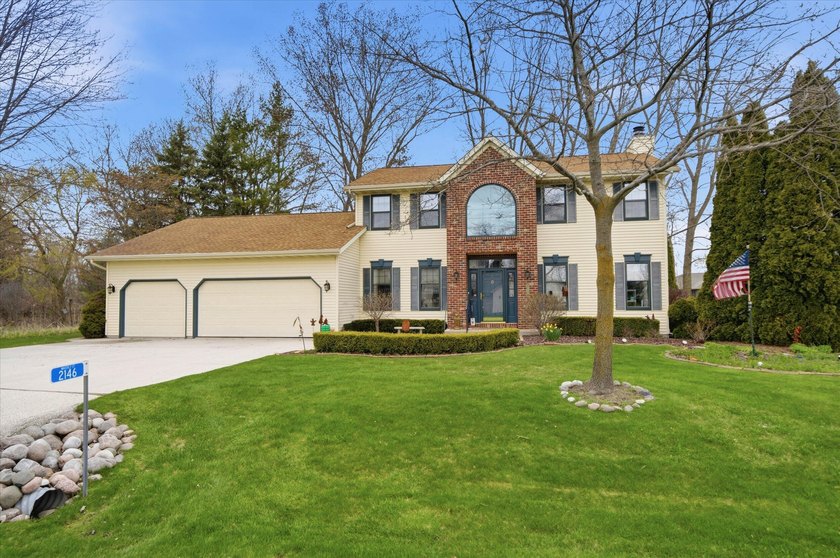 This timeless 2 story colonial is the home you have been - Beach Home for sale in Sheboygan, Wisconsin on Beachhouse.com