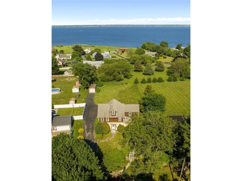 Step back in time with this exquisite property in Lighthouse - Beach Home for sale in Warwick, Rhode Island on Beachhouse.com