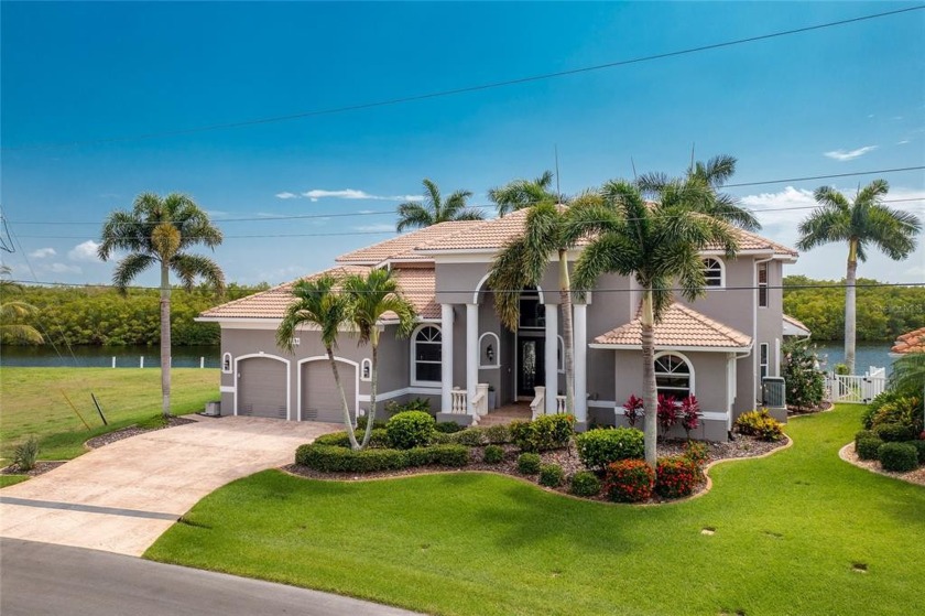 Location, Location, Location...This Stunning Waterfront Home - Beach Home for sale in Punta Gorda, Florida on Beachhouse.com