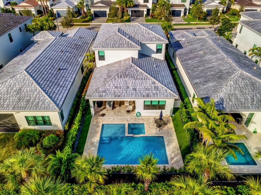 Stunning 2-story pool home recently built in 2020, situated on - Beach Home for sale in Palm Beach Gardens, Florida on Beachhouse.com