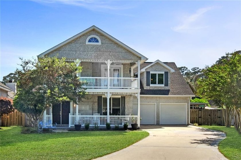 Discover this charming 4-bedroom, 2.5-bath coastal cottage - Beach Home for sale in Saint Simons, Georgia on Beachhouse.com