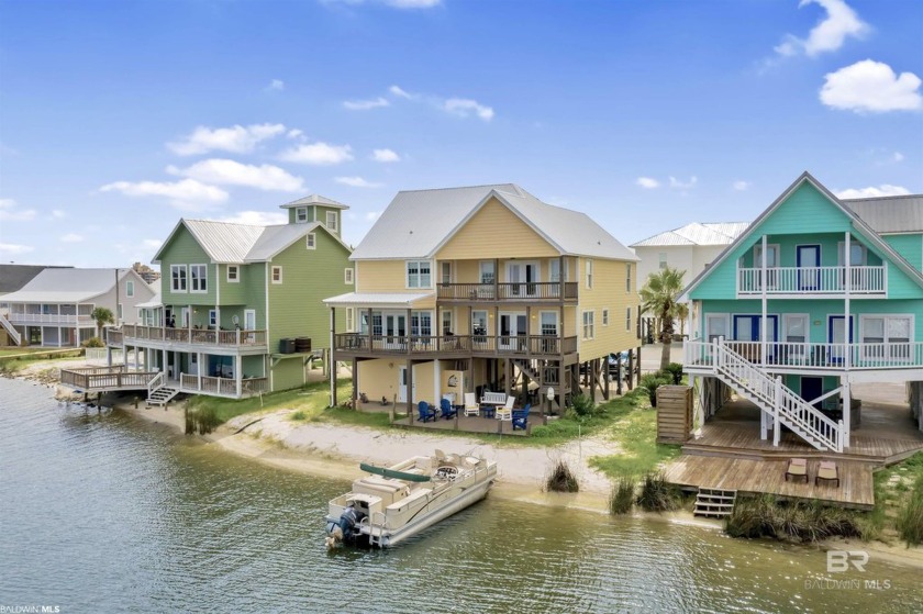 Prime location in Lagoon Pass on a peninsula that alludes to - Beach Home for sale in Gulf Shores, Alabama on Beachhouse.com