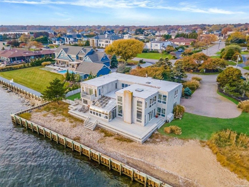 Introducing a rare opportunity to own a striking post modern - Beach Home for sale in East Islip, New York on Beachhouse.com