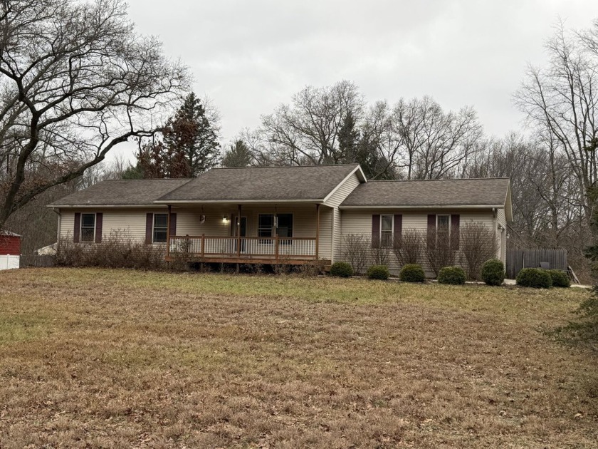 This 4 Bedroom, 2 Bath, Walkout Ranch with a 2-stall attached - Beach Home for sale in Whitehall, Michigan on Beachhouse.com