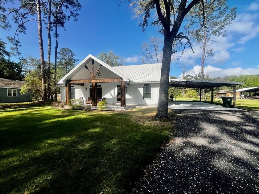 Welcome home to this charming three-bedroom, two-bathroom gem - Beach Home for sale in Brunswick, Georgia on Beachhouse.com