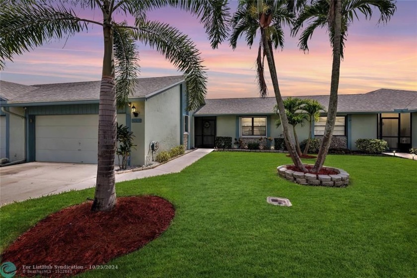 Freshly painted home features luxury flooring in the main living - Beach Condo for sale in Boca Raton, Florida on Beachhouse.com