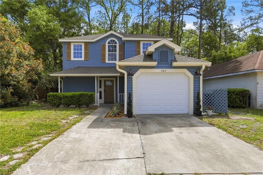 Step into this beautifully designed two-story home featuring a - Beach Home for sale in Saint Marys, Georgia on Beachhouse.com